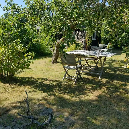 Feriehus Black-painted Wooden House From 1960 On Femo *