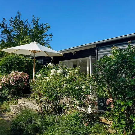 Feriehus Black-painted Wooden House From 1960 On Femo *